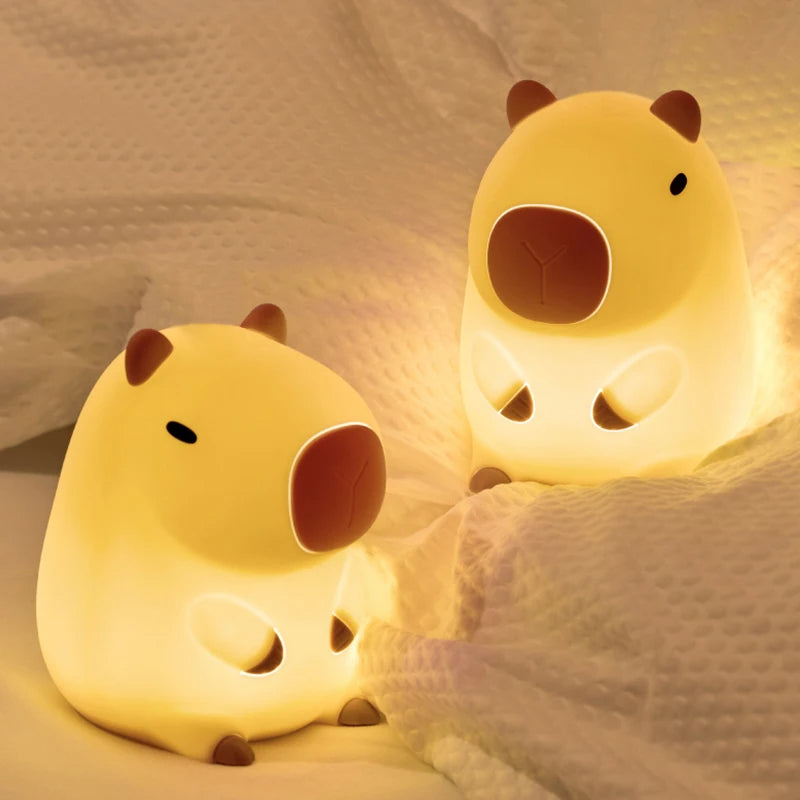 Capybara night light presented on a blanket