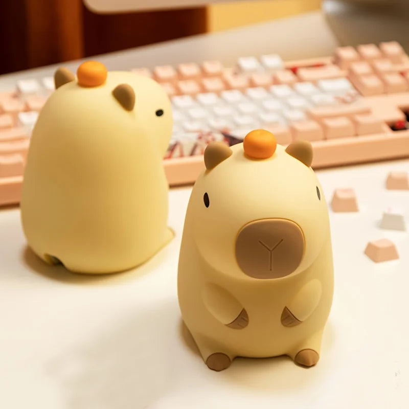 Capybara night light on a desk with a keyboard behind