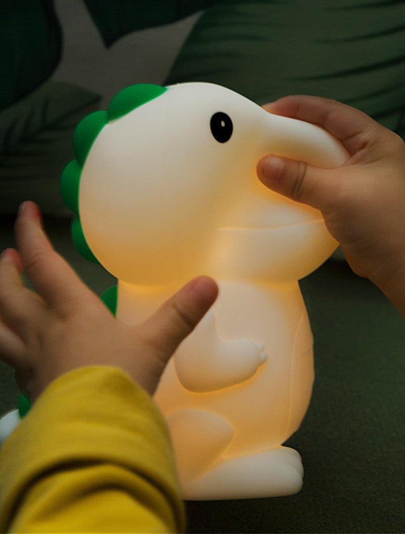 Squishy and squeezable dinosaur night light.