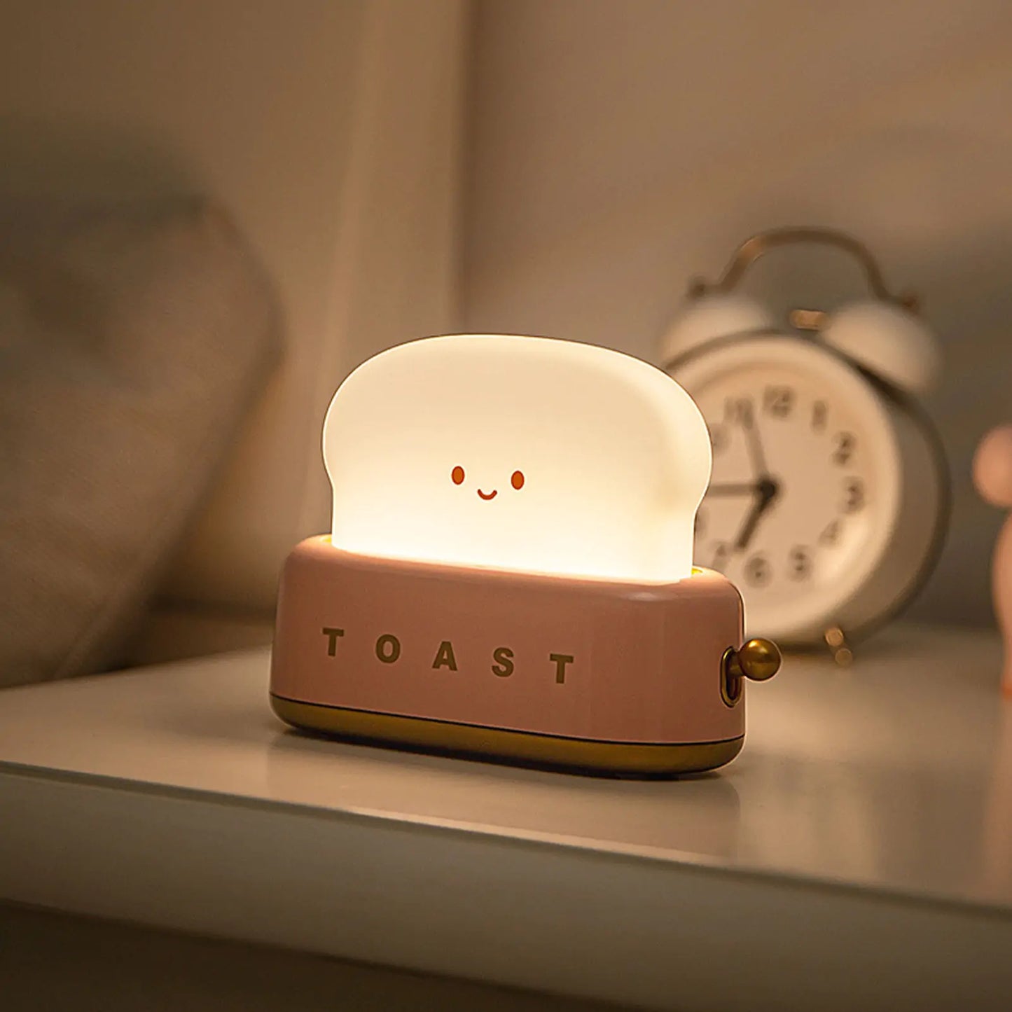 Pink Bread Toast Night Light On Bedside Table Illuminating in the Dark